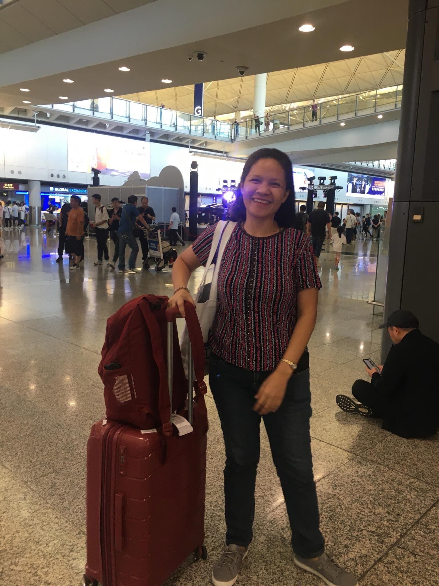 Happy helper arriving at Hong Kong airport