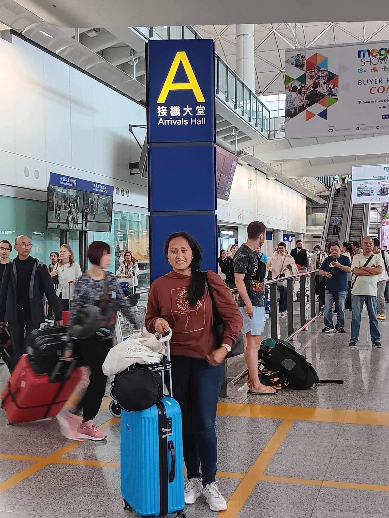 Helper at Hong Kong Arrivals Hall